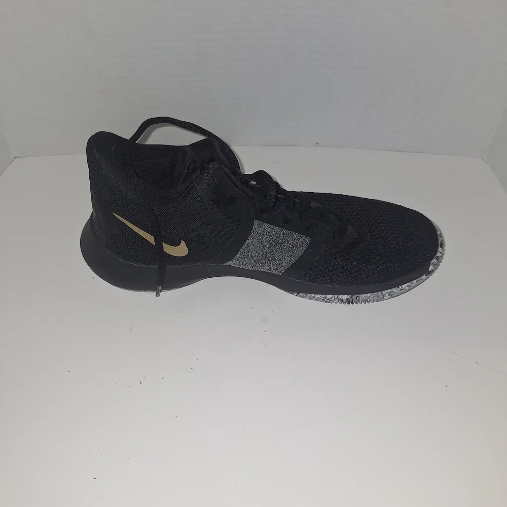 Nike Black and Gray Sneakers with Gold Swoosh